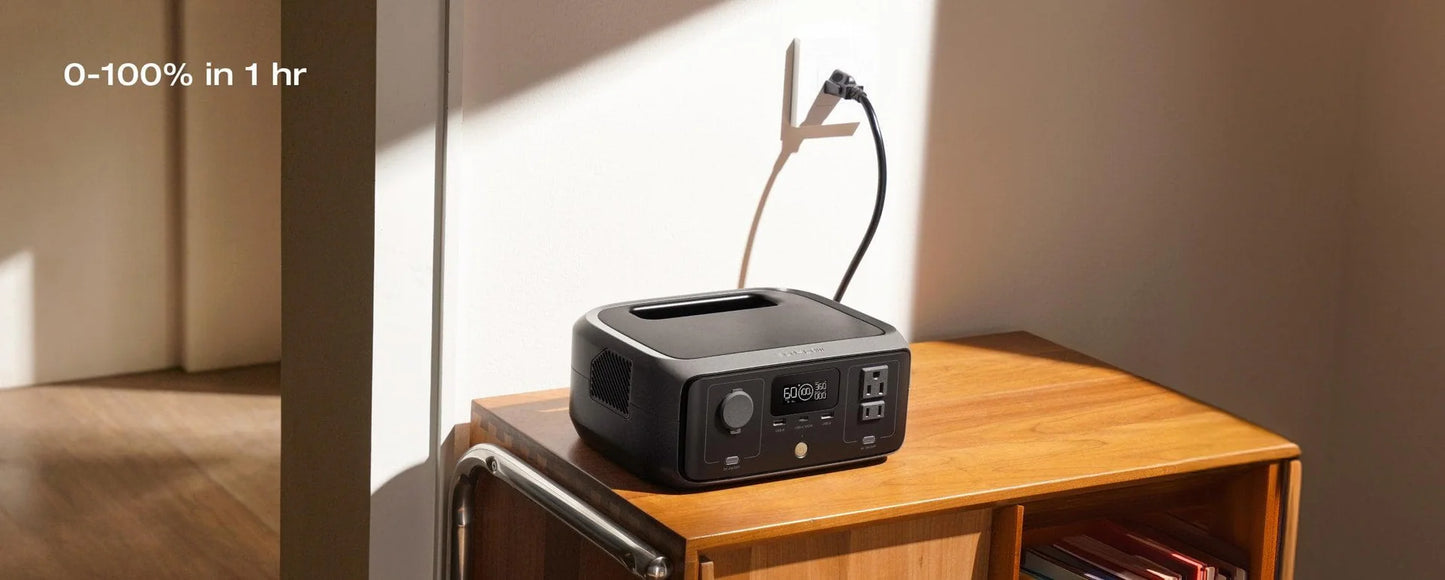 Portable power station on a wooden table with a neutral background