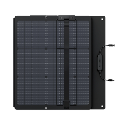 Black solar panel with connectors on a white background