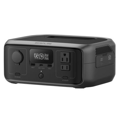 Black power station with digital display and multiple outlets on a white background