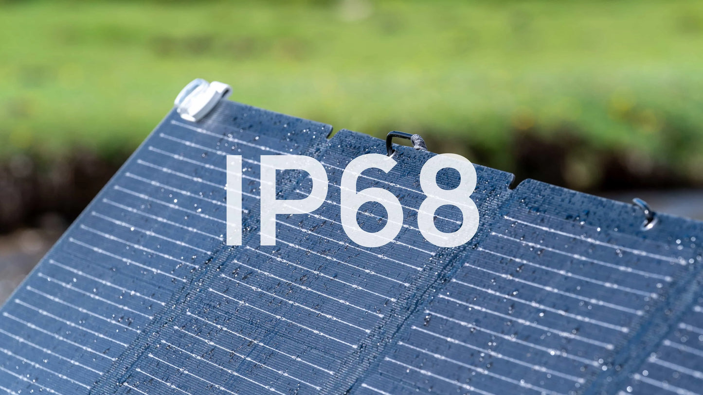 Solar panel with 'IP68' rating text on a blurred green background