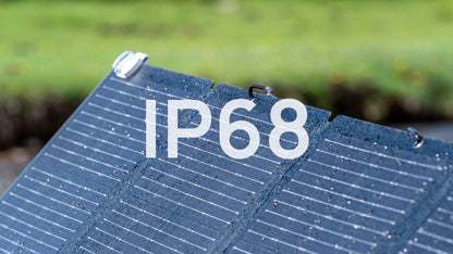 Solar panel with 'IP68' rating text on a blurred green background